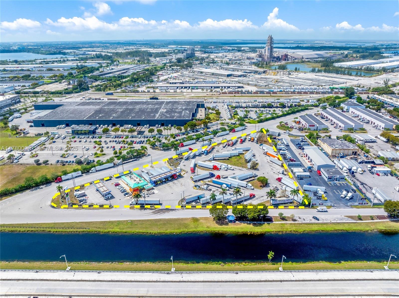 Aerial view of the Mobil truck stop and travel center on NW South River Drive in Medley, Florida