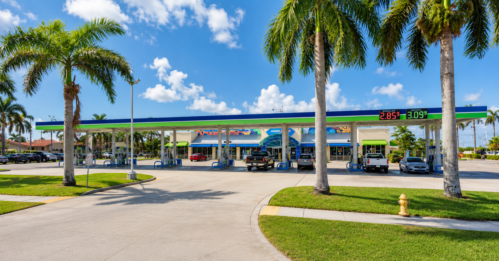Gas station with fuel canopy, convenience store and palm trees at 1460 N Krome Ave, Homestead, Florida